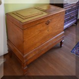 F49. Cedar trunk with paneled top. 27”h x 41”w x 21”d - $175 